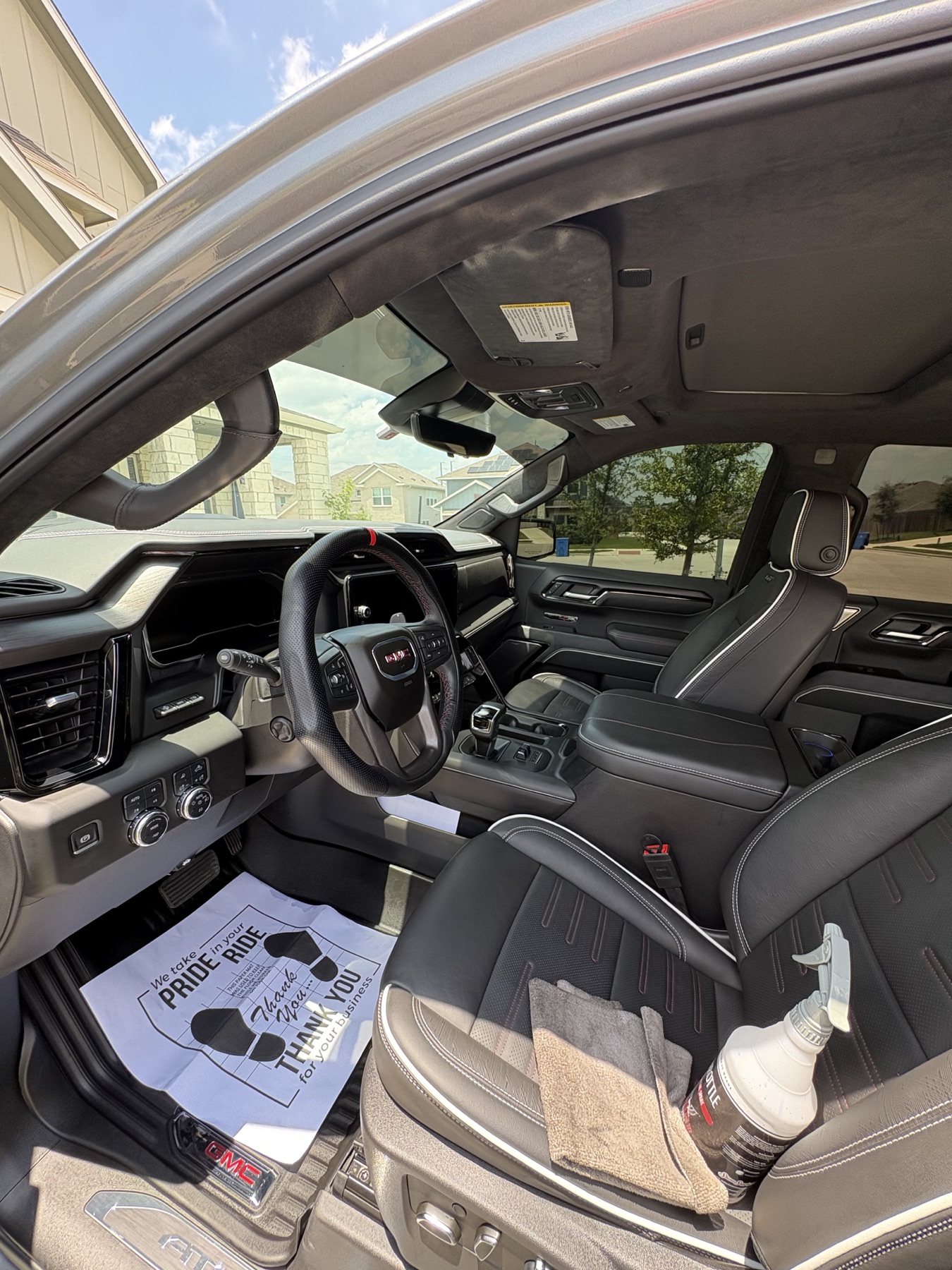 Clean GMC front cabin and leather seats after interior detail